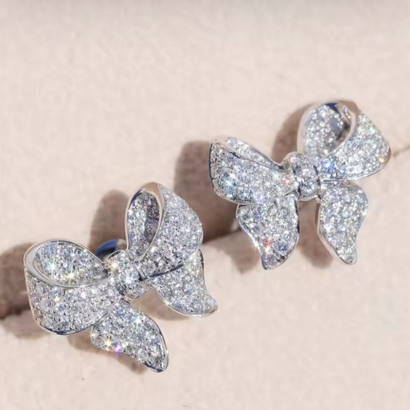 Elegant Silver Bow Earrings - Picture 2 of 2